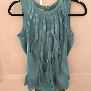 Sleeveless turquoise blouse
